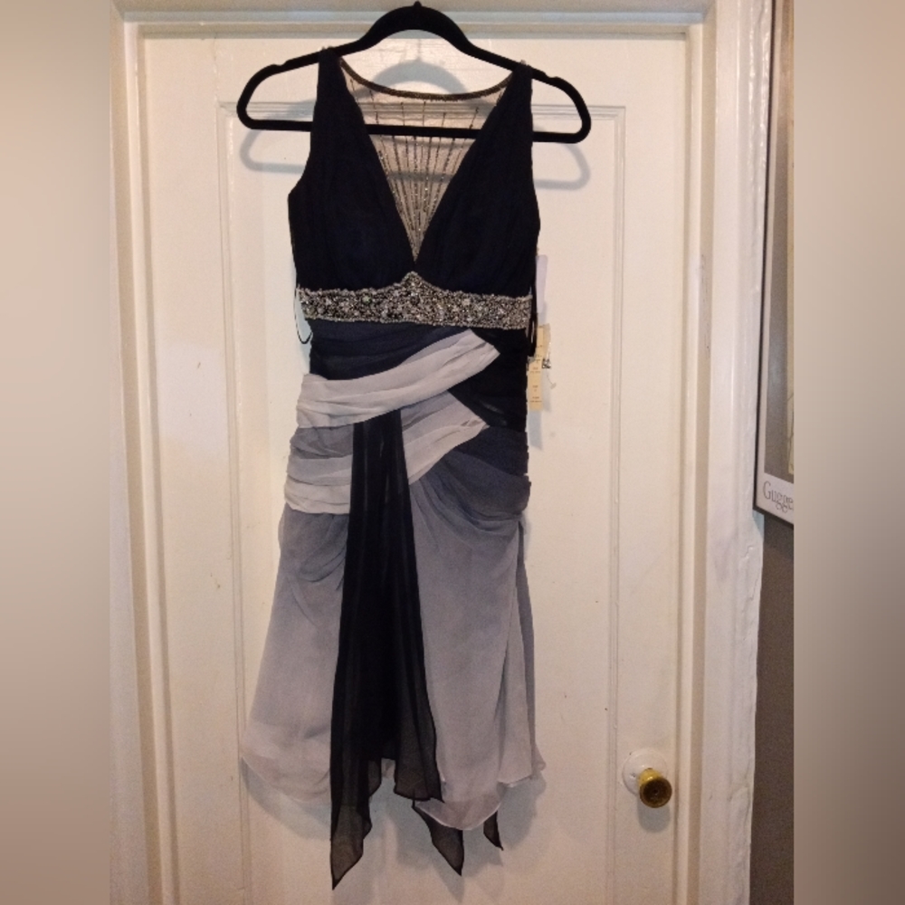 (A) "ISSUE" DRESS / GOWN